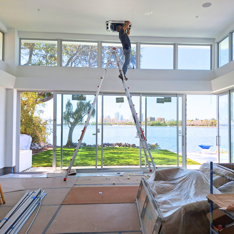 J&J Refrigeration Inc. working on a home in the Tampa Bay Area